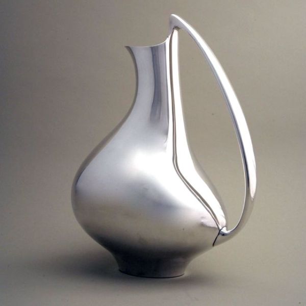 Iconic Georg Jensen pitcher no. 992 "pregnant duck" pitcher designed by Henning Koppel