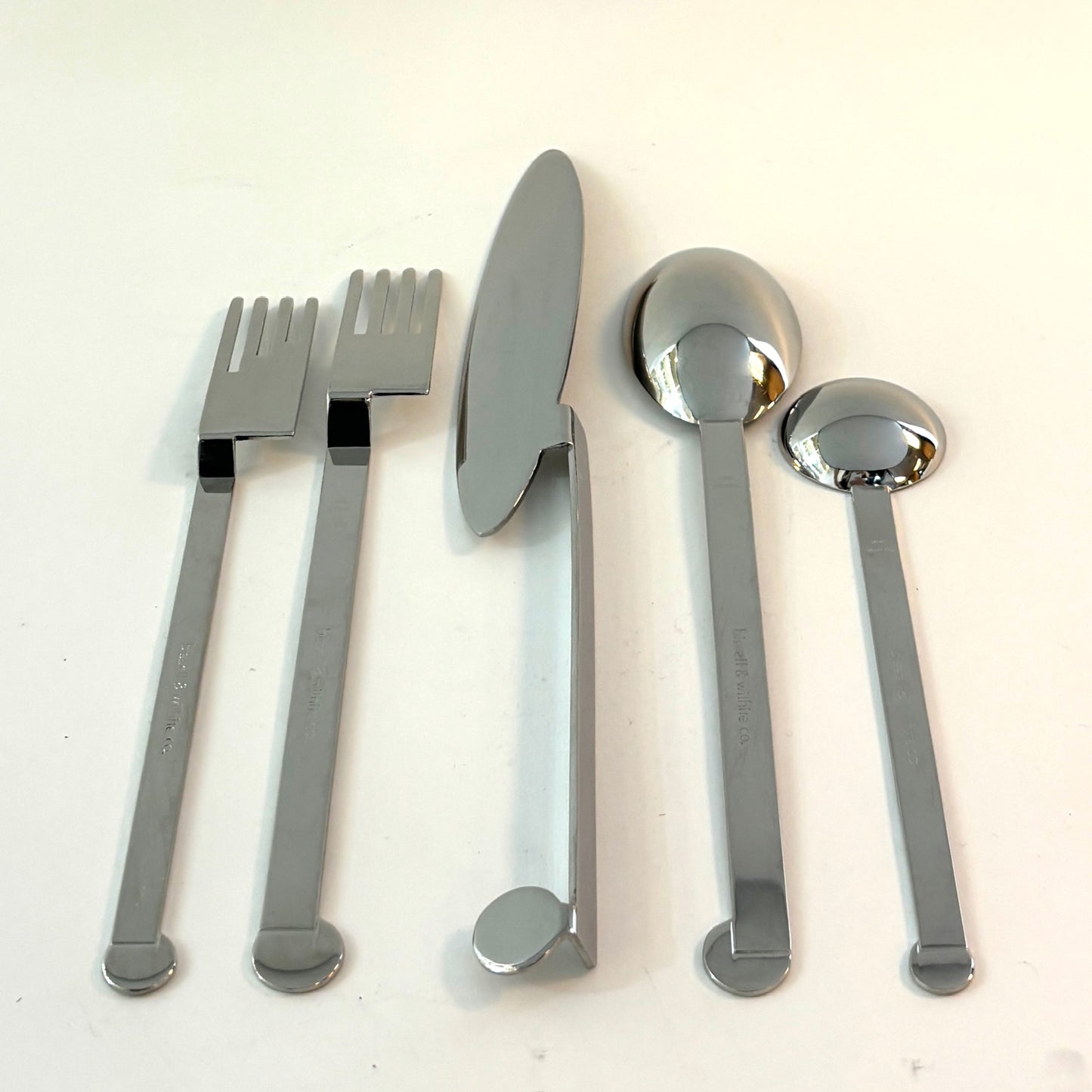 Estate Bissell & Wilhite Co. Stainless Steel Flatware in the "XUM" Pattern by Robert Wilhite Service of 12 (65 Pieces)