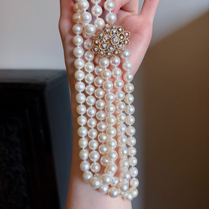 Estate Triple Strand Pearl Necklace with 18kt Gold with 19 Diamond Clasp