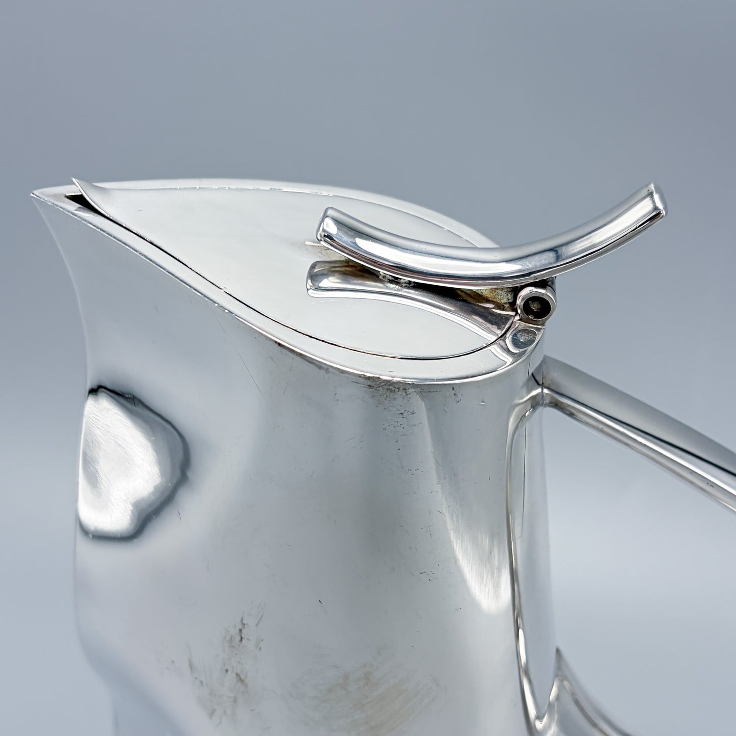 Sterling silver Modernist Decanter with Hinged Lid by Ravissant