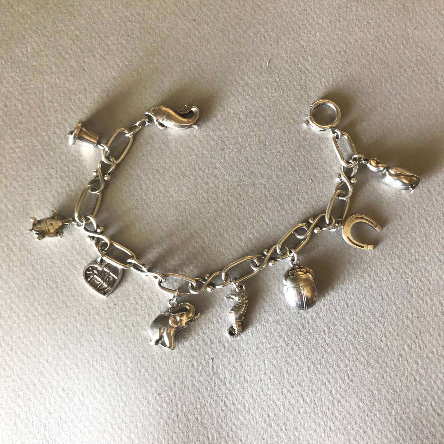 Georg Jensen Sterling Silver  "Charm" Bracelet No. 80 ( 9 charms)