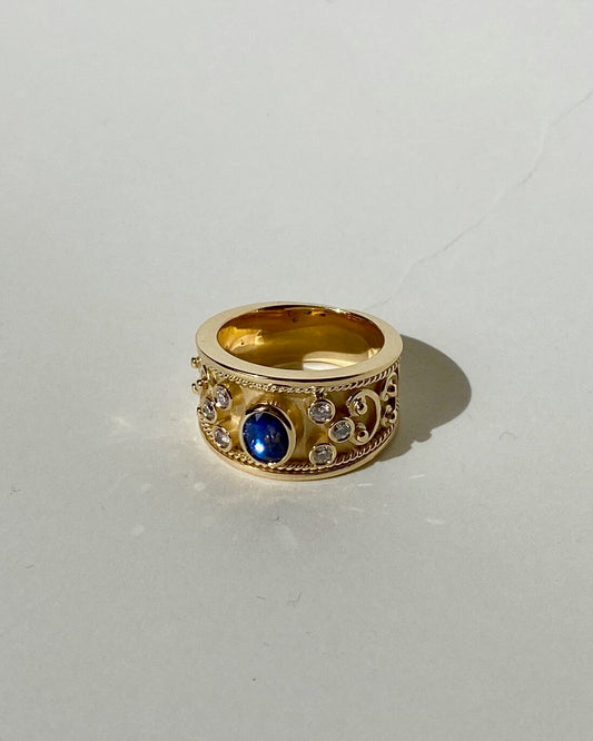 Gold Ring with Diamonds and Sapphire