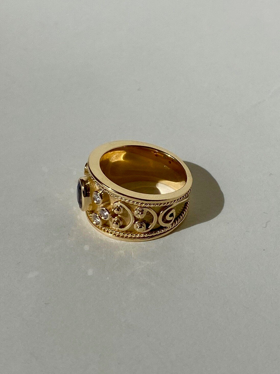 Gold Ring with Diamonds and Sapphire