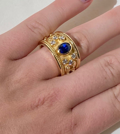 Gold Ring with Diamonds and Sapphire