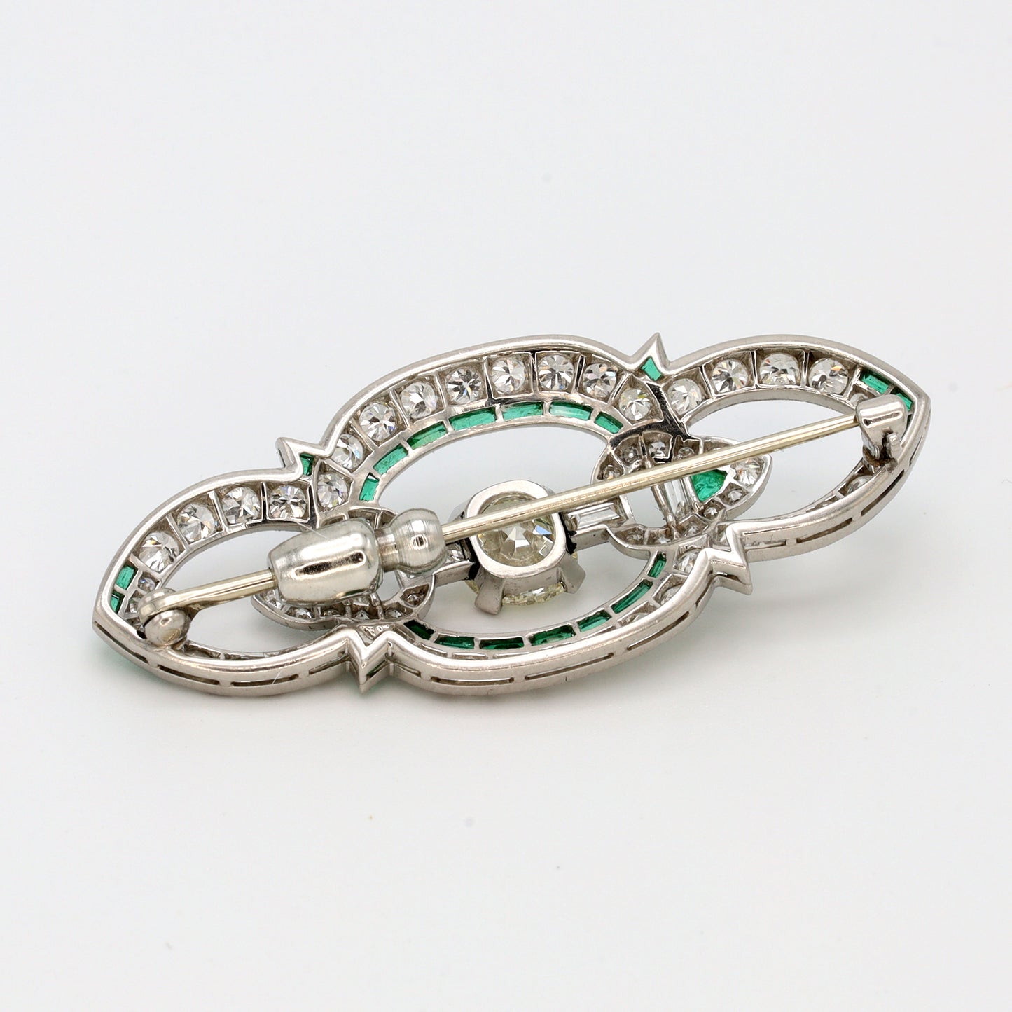 Estate Art Deco Platinum Pin with Emeralds and Diamonds