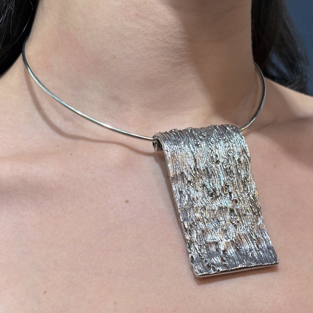Estate Sterling Silver Knud V. Andersen Neck Ring with Bark Ribbon Pendant c 1970s