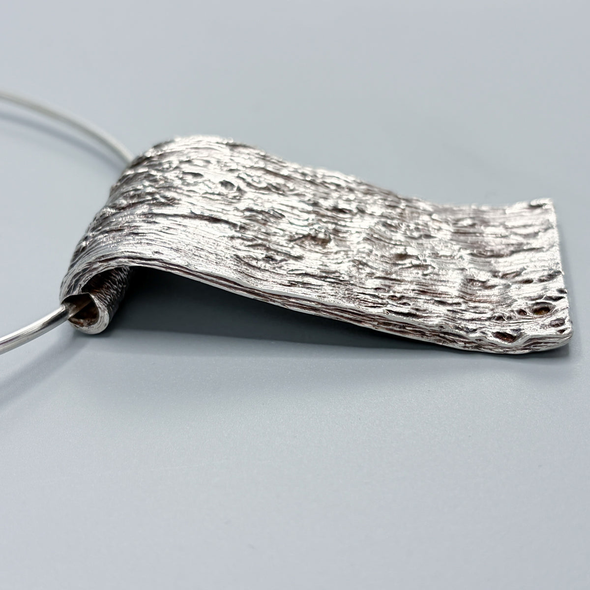 Estate Sterling Silver Knud V. Andersen Neck Ring with Bark Ribbon Pendant c 1970s