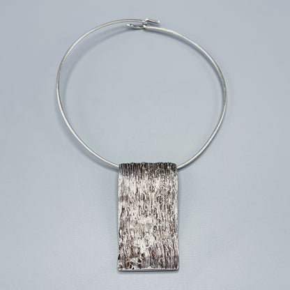 Estate Sterling Silver Knud V. Andersen Neck Ring with Bark Ribbon Pendant c 1970s