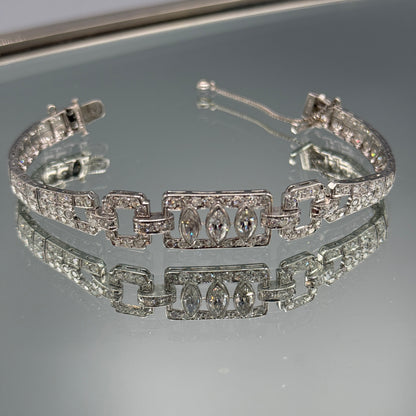 Estate Diamond Tennis Bracelet with Three Marquise Center Stones in Platinum