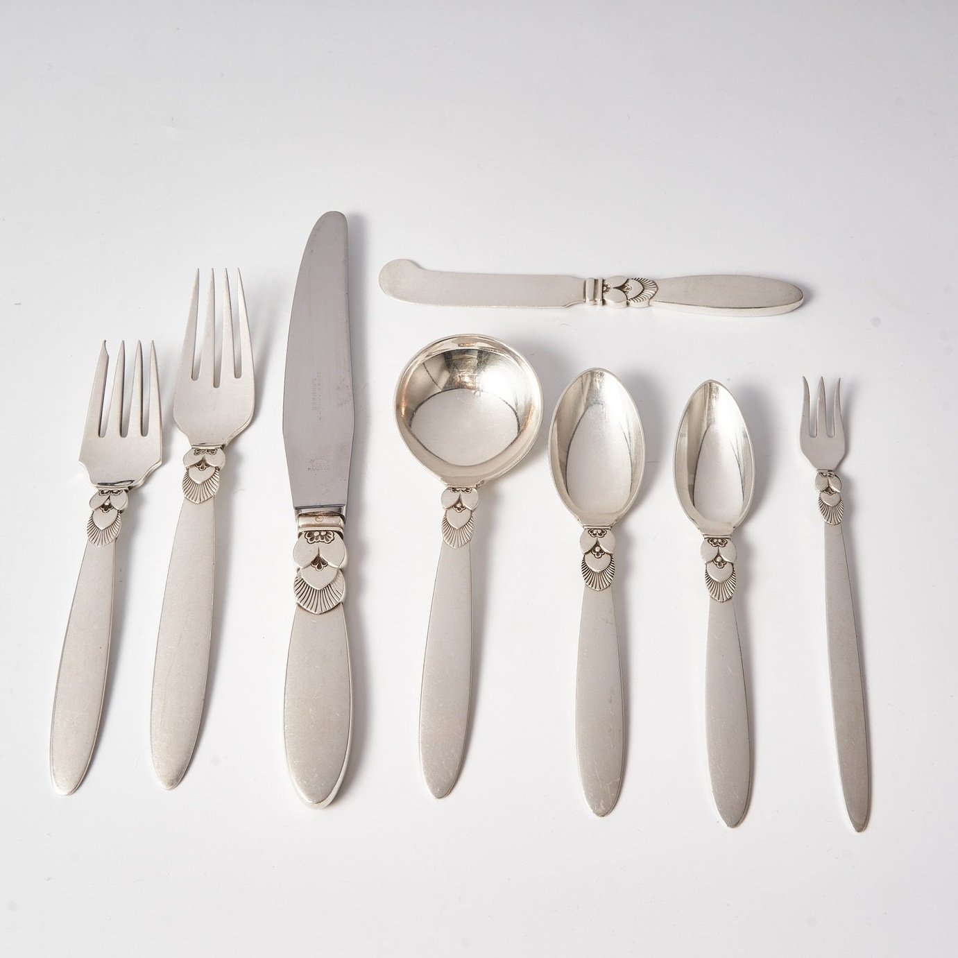 Estate Georg Jensen Sterling Silver Flatware in the “Cactus” Pattern Service for 12 with Serving Pieces by Gundorph Albertus (100 Pieces)