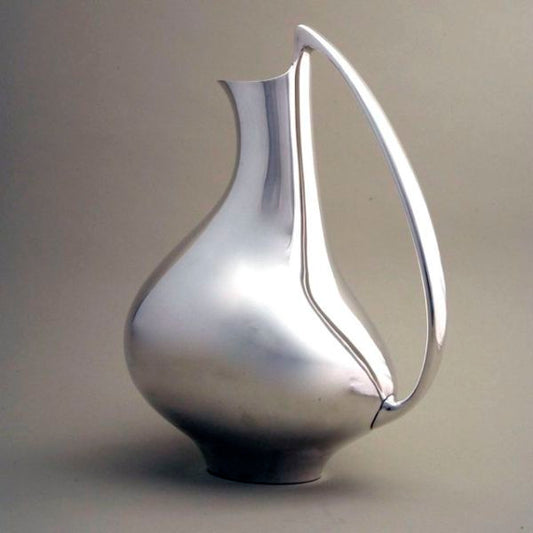 Iconic Georg Jensen pitcher no. 992 "pregnant duck" pitcher designed by Henning Koppel