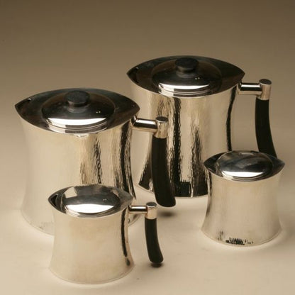 Christofle Sterling Silver Coffee and Tea Service in the "Masai" Pattern